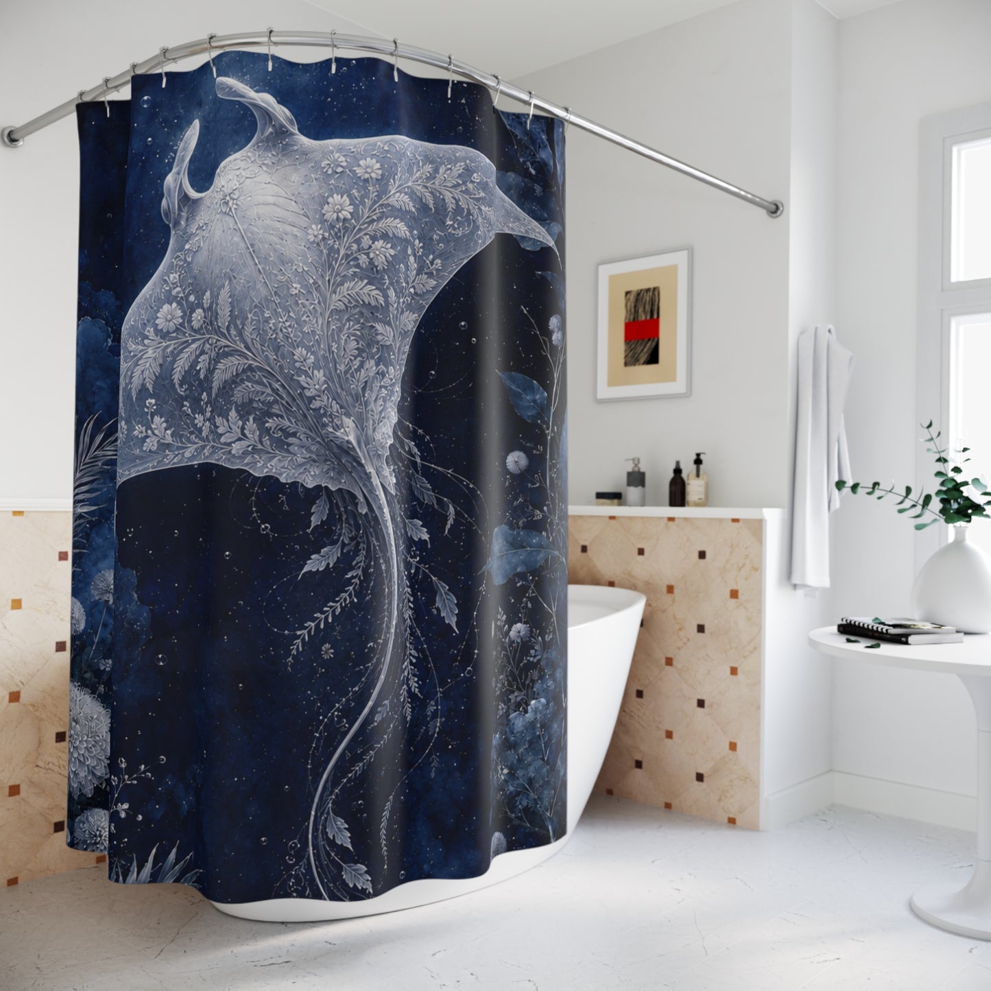 A dark blue and white shower curtain featuring a stylized whale or dolphin design with floral details, hanging in a bright white bathroom.