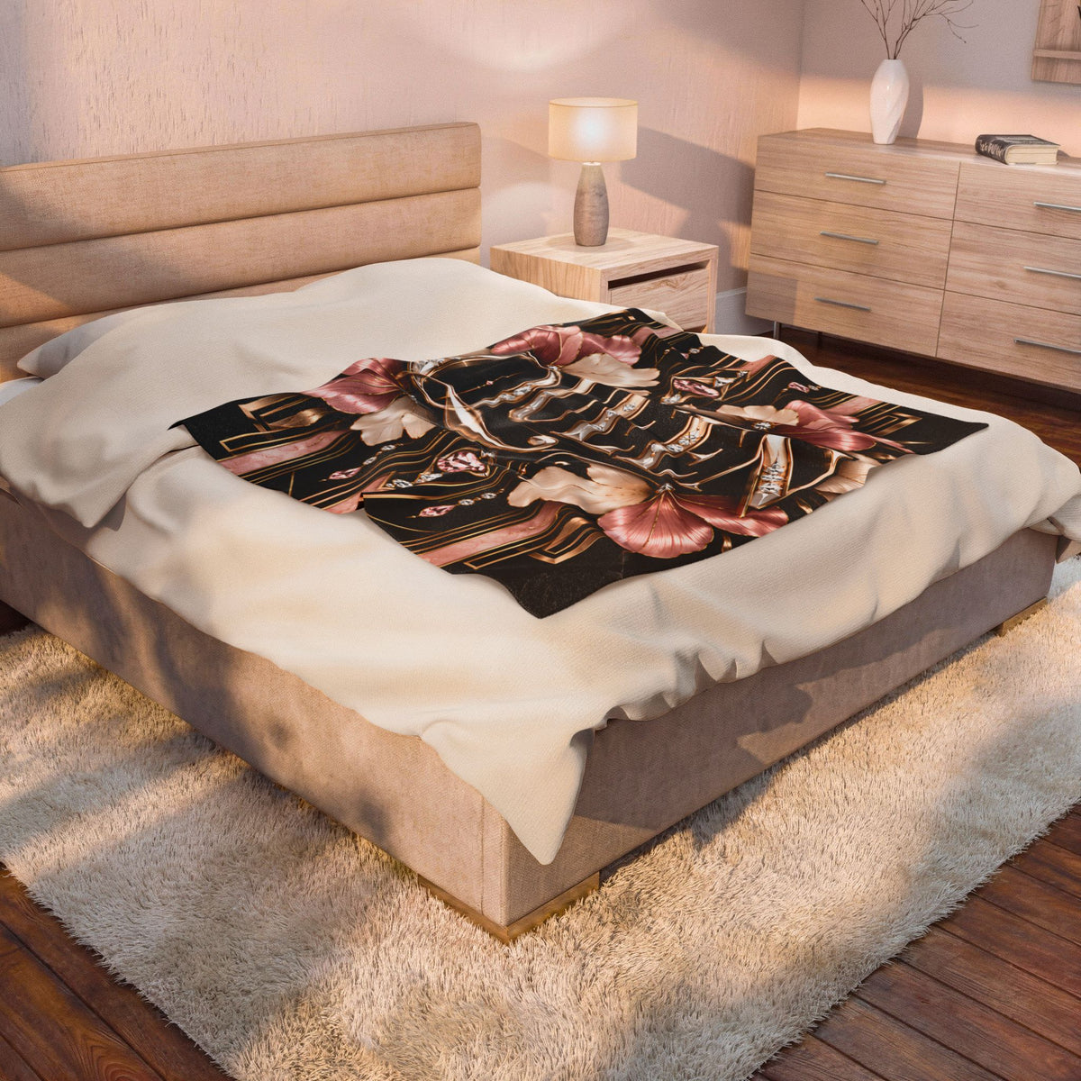 Bedroom with a bed featuring a decorative blanket and a nightstand with a lamp.