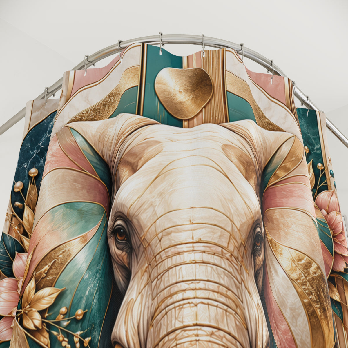 A close-up of a large decorative elephant head artwork mounted on a curved wall, featuring cream, gold, teal, pink, and brown tones with floral and leaf motifs.