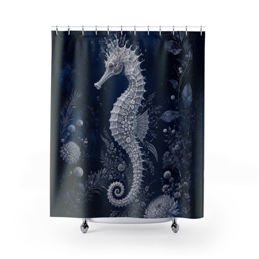 A shower curtain featuring a detailed white seahorse and sea plant design on a dark navy blue background, shown hanging from silver hooks with a white tub edge visible at the bottom.