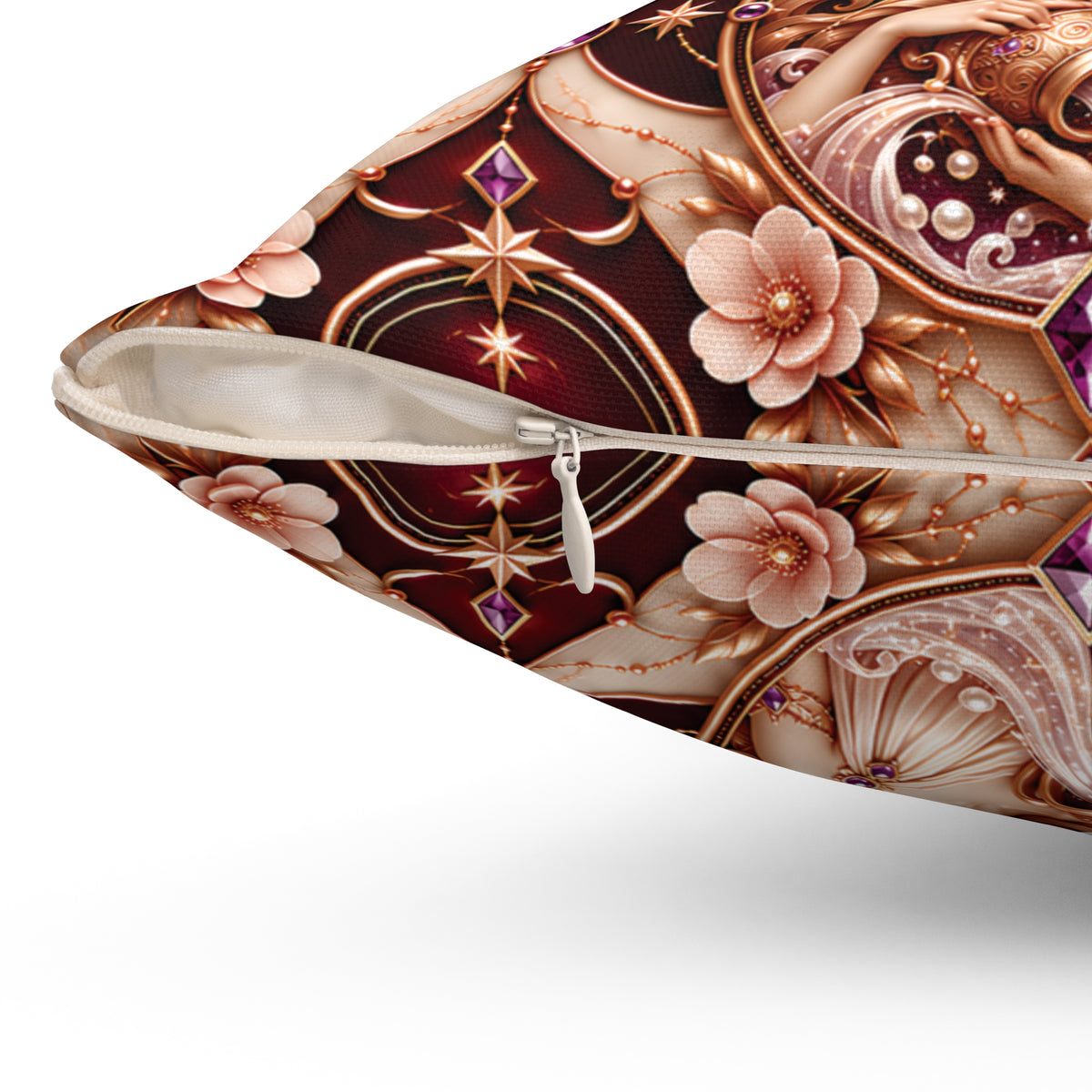 Close-up of a decorative throw pillow with a detailed vintage-style print featuring pink flowers, gold filigree, and a deep burgundy background, shown with the zipper partially open.