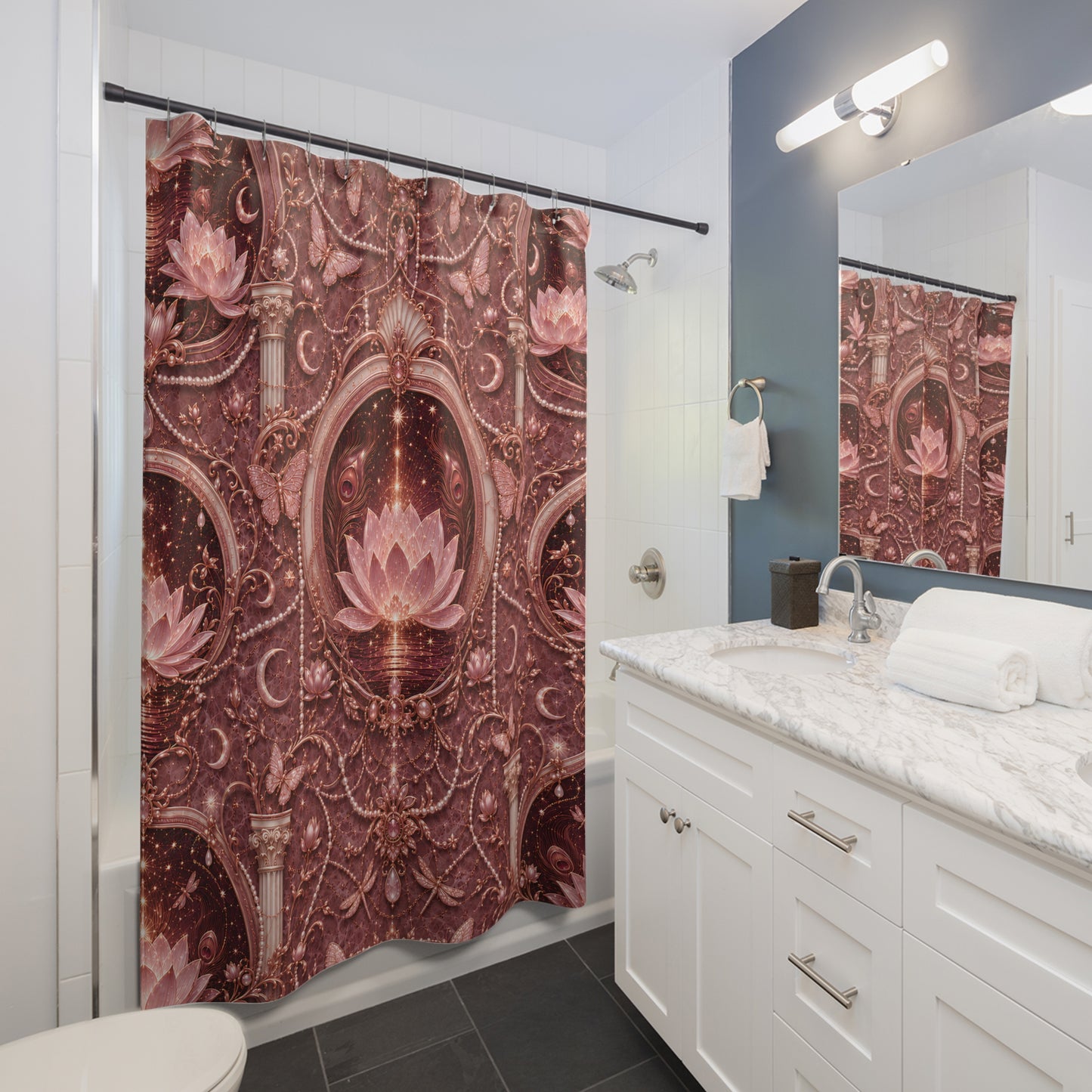 A bathroom scene showing a bathtub with a shower curtain featuring an ornate baroque-style pattern in dusty rose, burgundy, and gold, with pink lotus flowers. A white vanity with a marble countertop and mirror is visible on the right.