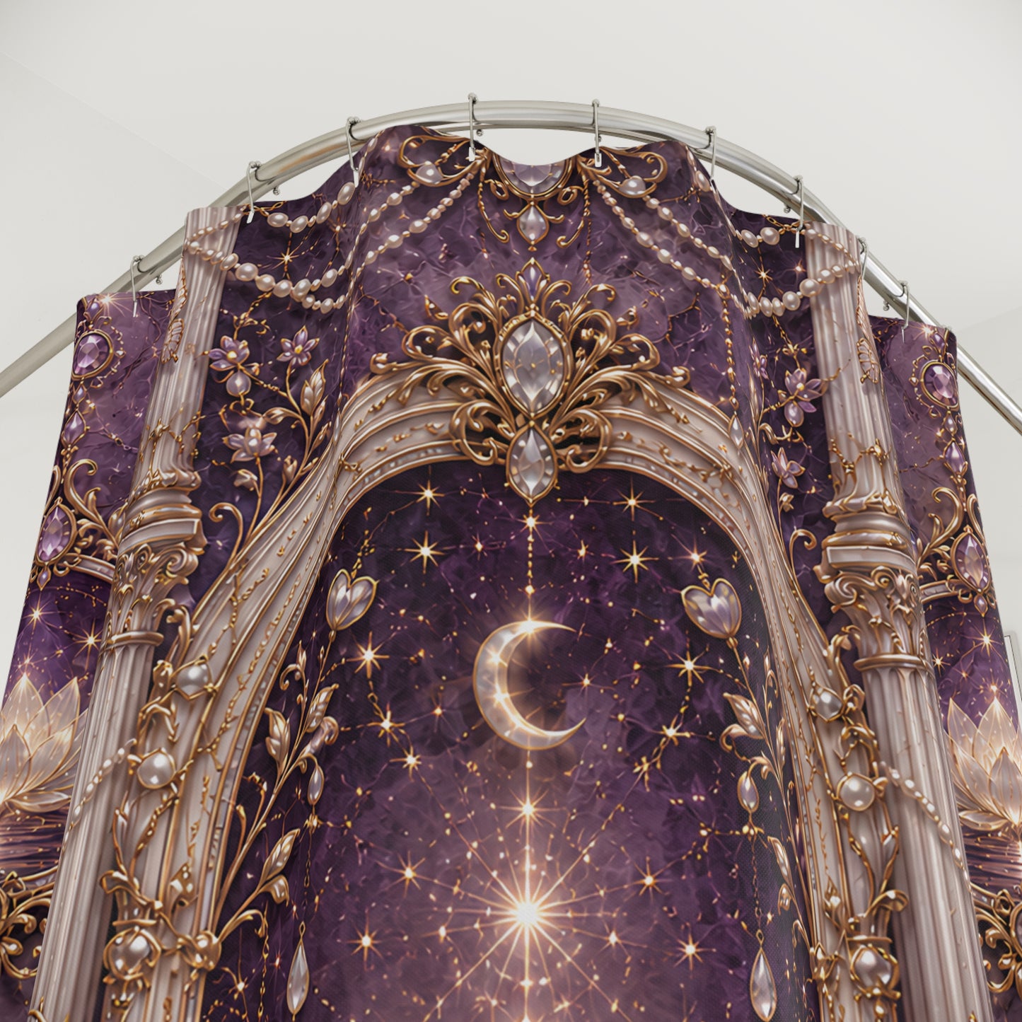 A close-up of an ornate purple and gold celestial fabric shower curtain featuring a crescent moon, stars, pearls, and decorative architectural details.