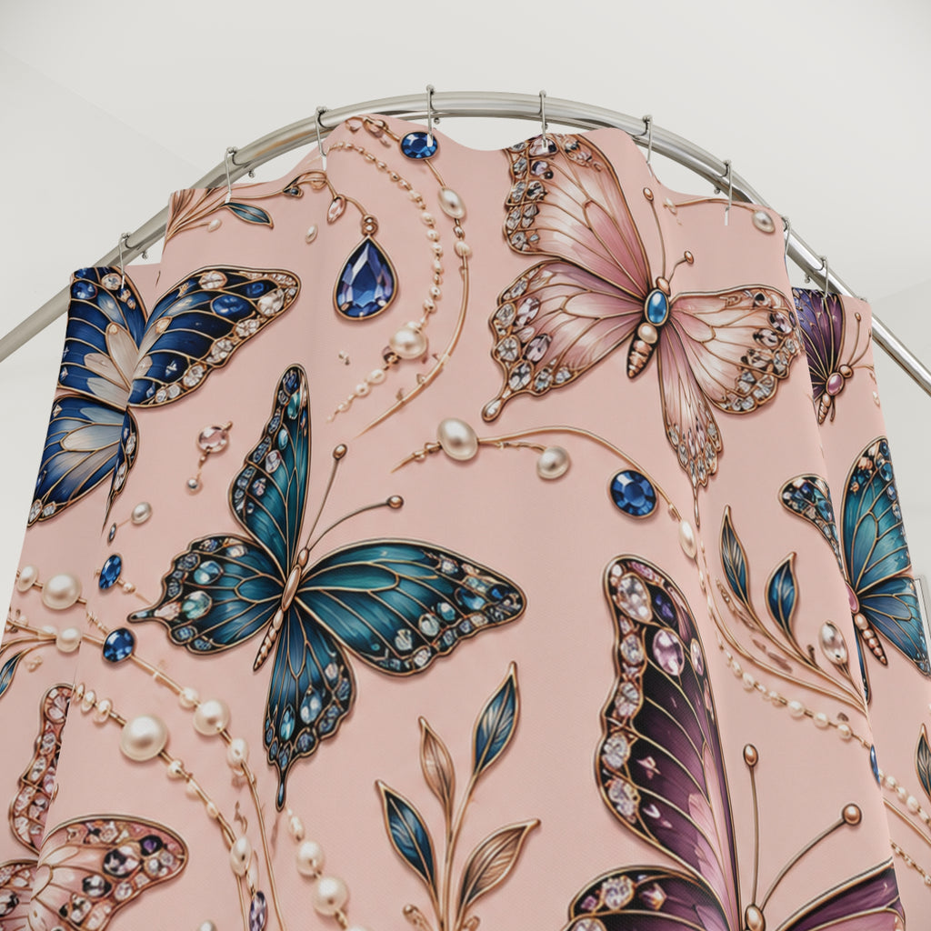 A close-up of a pink fabric or wallpaper featuring an ornate pattern of large jeweled butterflies in blue, purple, and pink, accented with pearls and blue gemstones, draped over a curved silver metal frame.