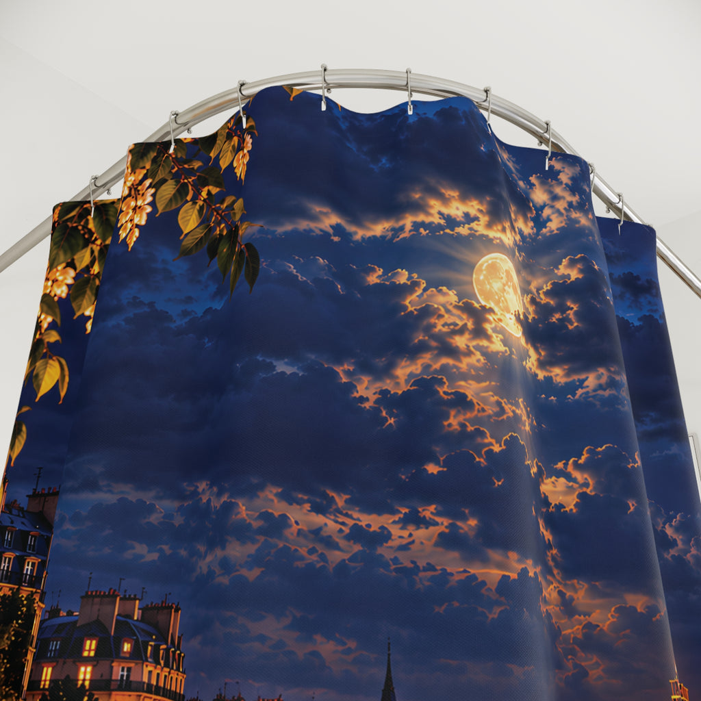 A large printed curtain panel hanging from a curved metal rod, featuring a dramatic night sky scene with a glowing full moon, sun rays, dark blue clouds, and warm orange light. A small portion of a building and tree is visible at the lower left edge.