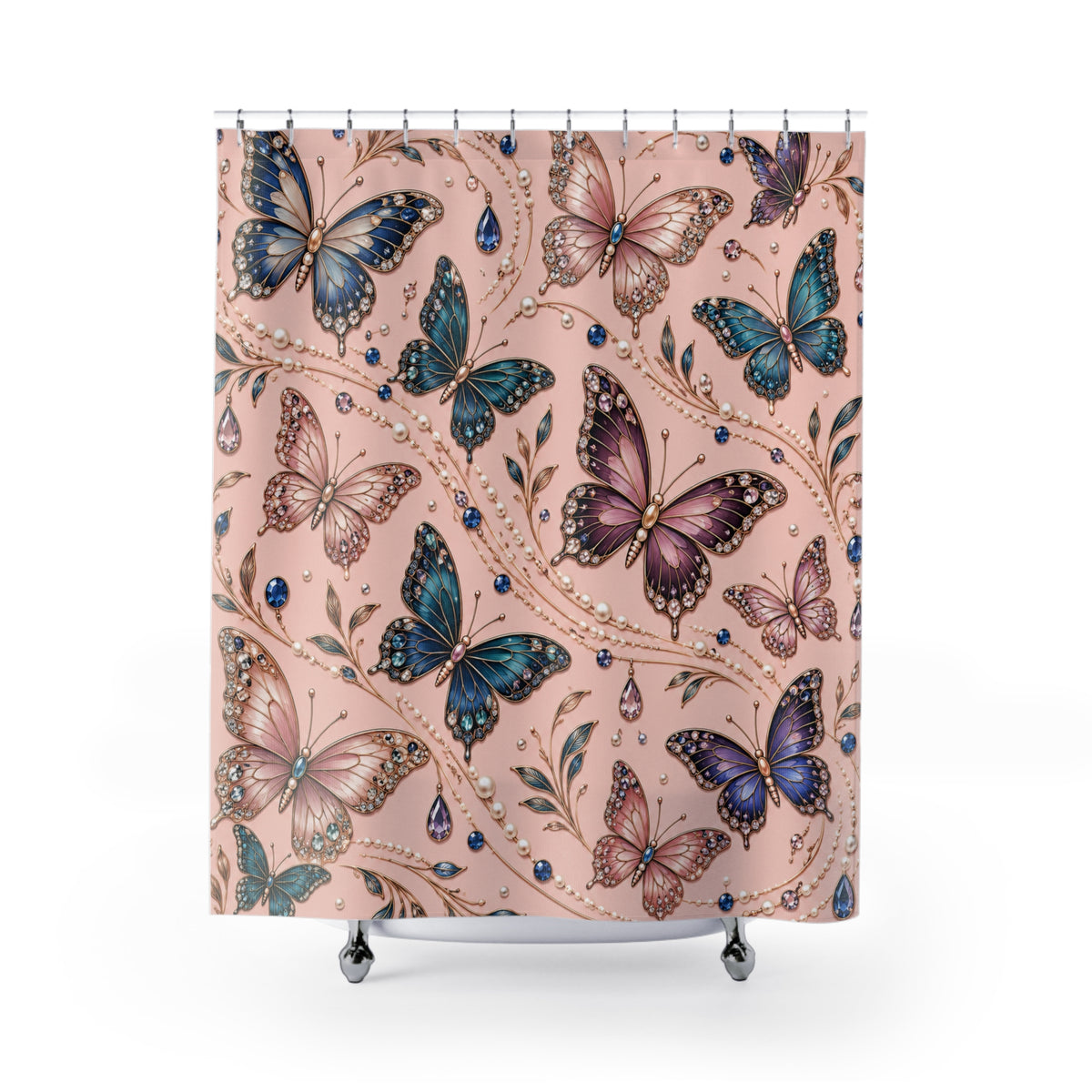 A shower curtain featuring a detailed pattern of colorful butterflies in shades of blue, purple, and pink over a dusty pink background, decorated with delicate gold vine details and small blue gem accents. The curtain is shown hanging from silver rings on a white rod, with the bottom of the curtain resting on a white tub edge.