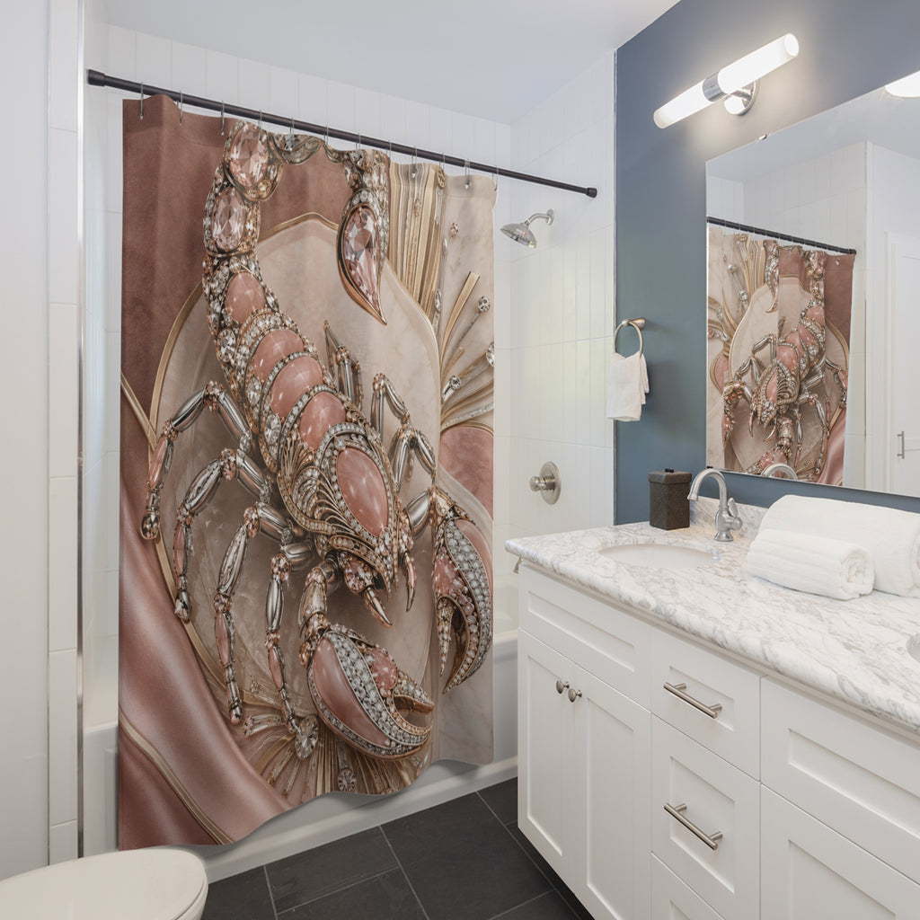 A luxury shower curtain featuring a large, detailed illustration of a scorpion adorned with sparkling rhinestones on a dusty rose and beige background. The curtain is shown hanging in a modern bathroom with white cabinets, a marble countertop, and a blue accent wall.