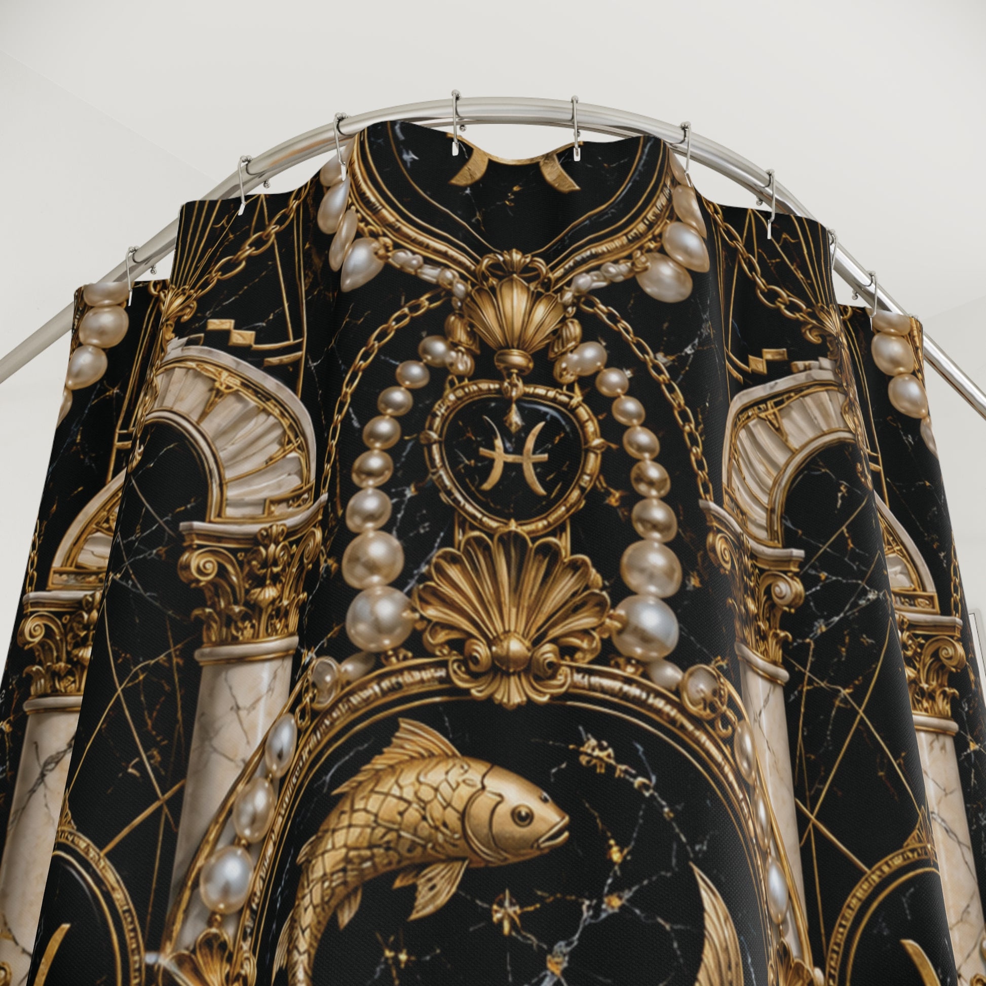 Decorative fabric with gold and black design featuring fish, pearls, and architectural elements.