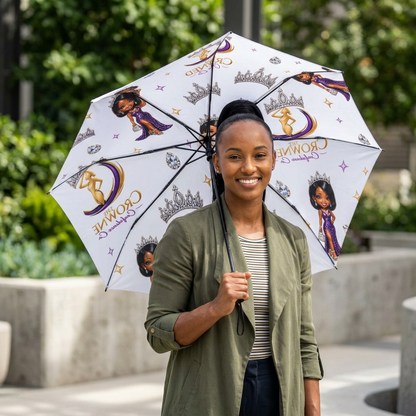Woman holding a decorative umbrella with cartoon characters and text.