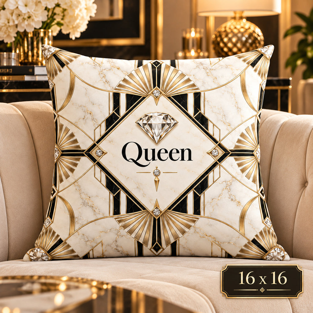 A square decorative throw pillow with an Art Deco style design featuring a cream marble background, gold geometric fan motifs, and black accents. The center of the pillow displays a large diamond graphic and the word 'Queen' in black serif text.