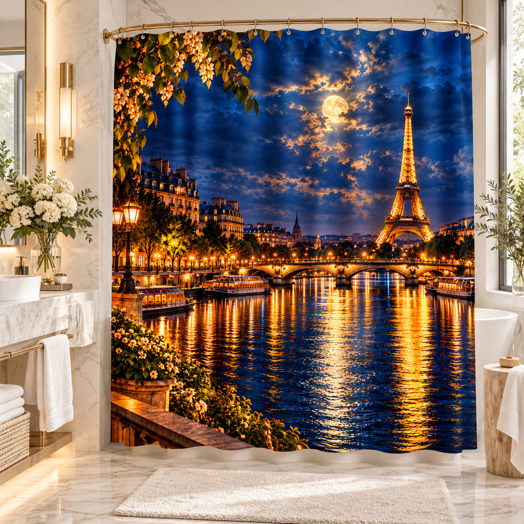 A Paris-themed shower curtain hanging in a bright, modern bathroom. The curtain features a detailed print of the Eiffel Tower at night, reflecting over the Seine River under a moonlit sky.