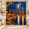 A Paris-themed shower curtain hanging in a bright, modern bathroom. The curtain features a detailed print of the Eiffel Tower at night, reflecting over the Seine River under a moonlit sky.