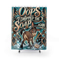 A novelty shower curtain featuring a retro-style illustration of a brown donkey stepping in water next to a bar of soap, with the text 'Oops I Dropped The Soap .