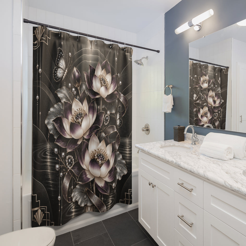 A black shower curtain with a large floral print of lotus flowers and butterflies, hanging in a modern white and blue-gray bathroom.