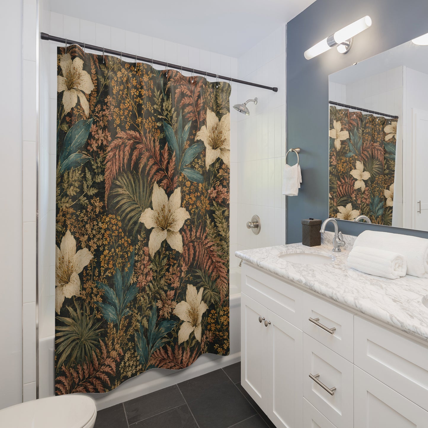 A bathroom scene showing a shower curtain with a dense botanical print, set in a modern bathroom with a white vanity, marble countertop, and a mirror reflecting the curtain.