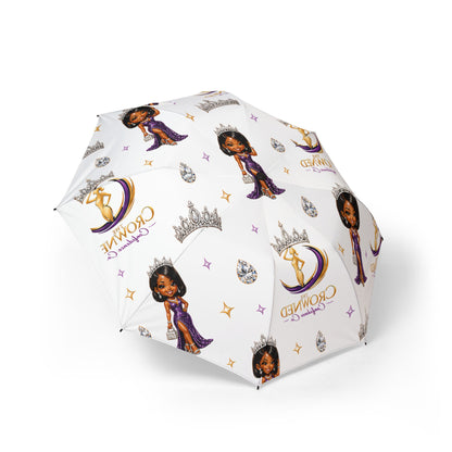 Umbrella with cartoon character and 'Crown Queen' text on a white background