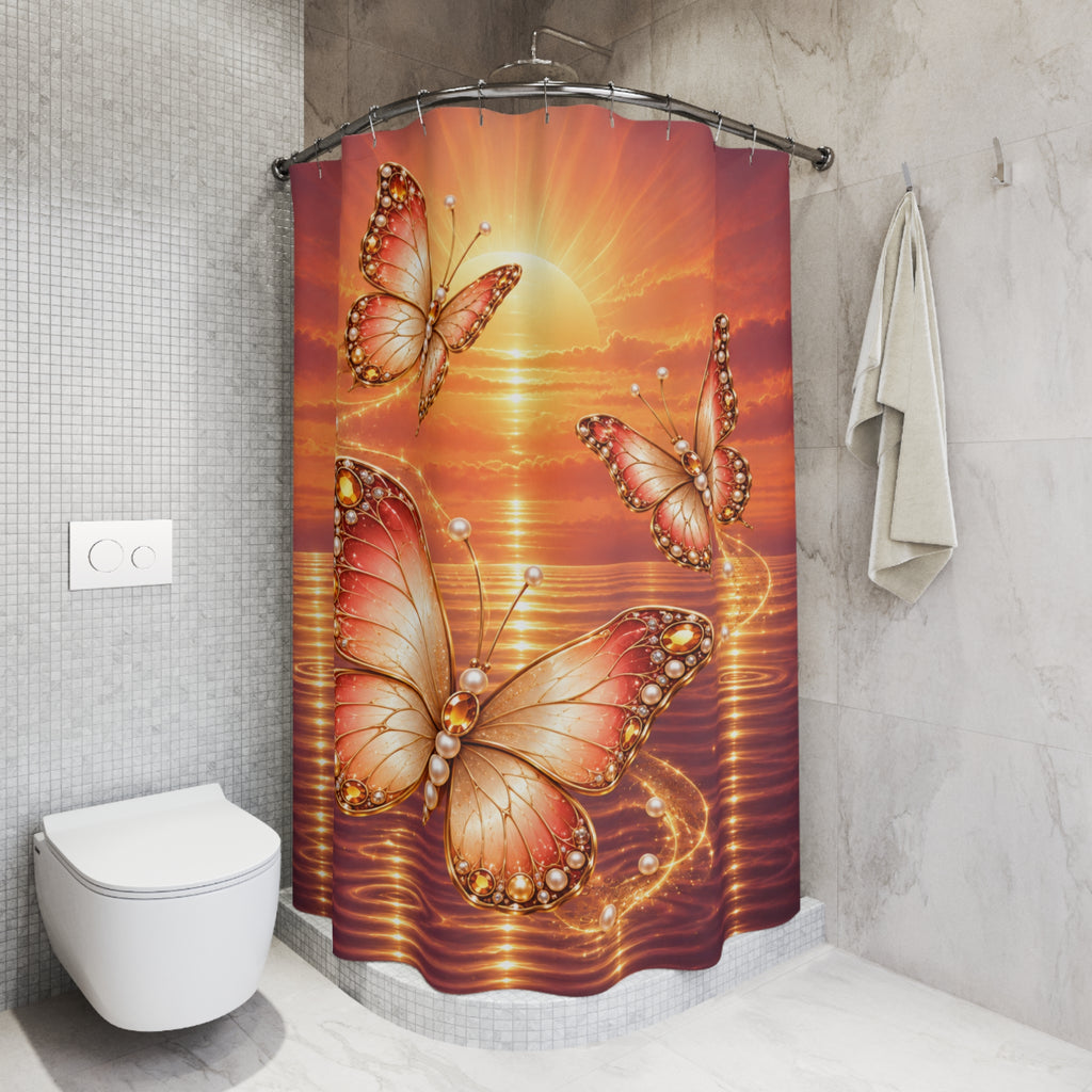 A shower curtain hanging in a modern bathroom, featuring a vibrant sunset scene with three large pink and orange butterflies adorned with pearl-like details over rippling water.