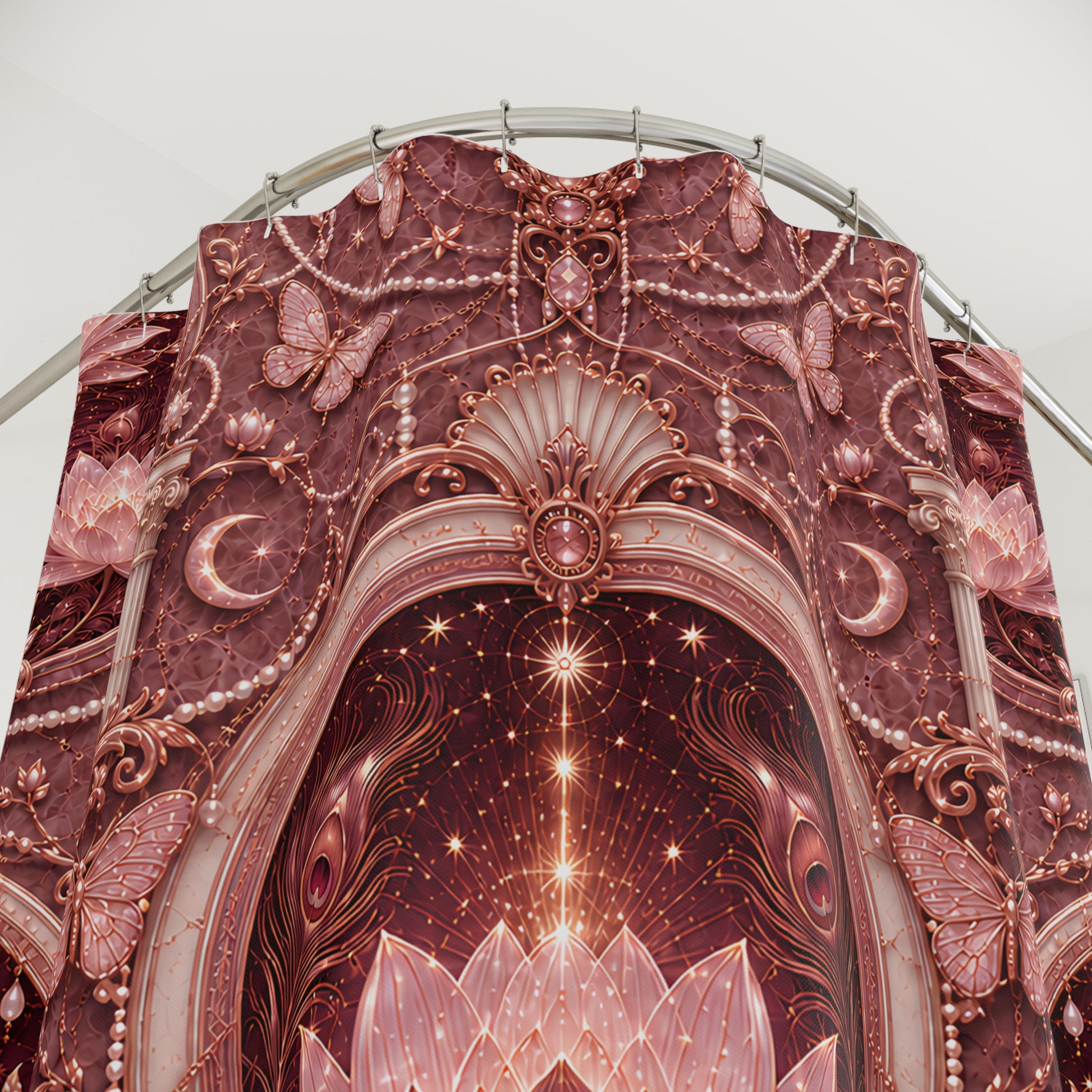 A large decorative event  shower curtain featuring an ornate celestial archway design in dusty rose, mauve, and pink tones, with butterflies, crescent moons, stars, and pearl-like accents.
