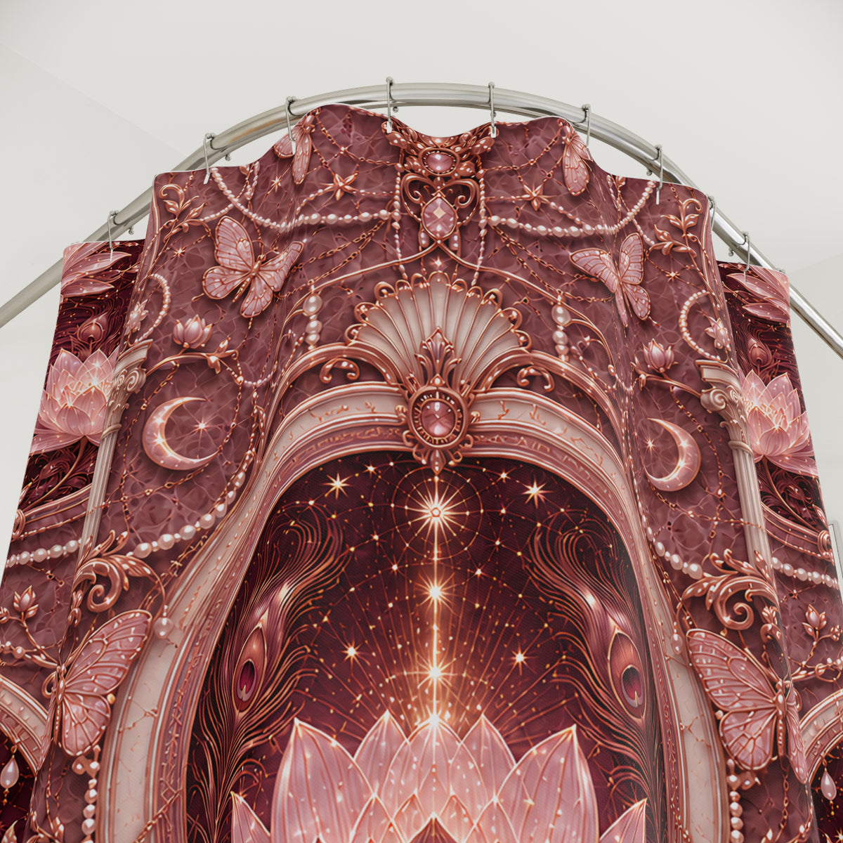 A large decorative event  shower curtain featuring an ornate celestial archway design in dusty rose, mauve, and pink tones, with butterflies, crescent moons, stars, and pearl-like accents.