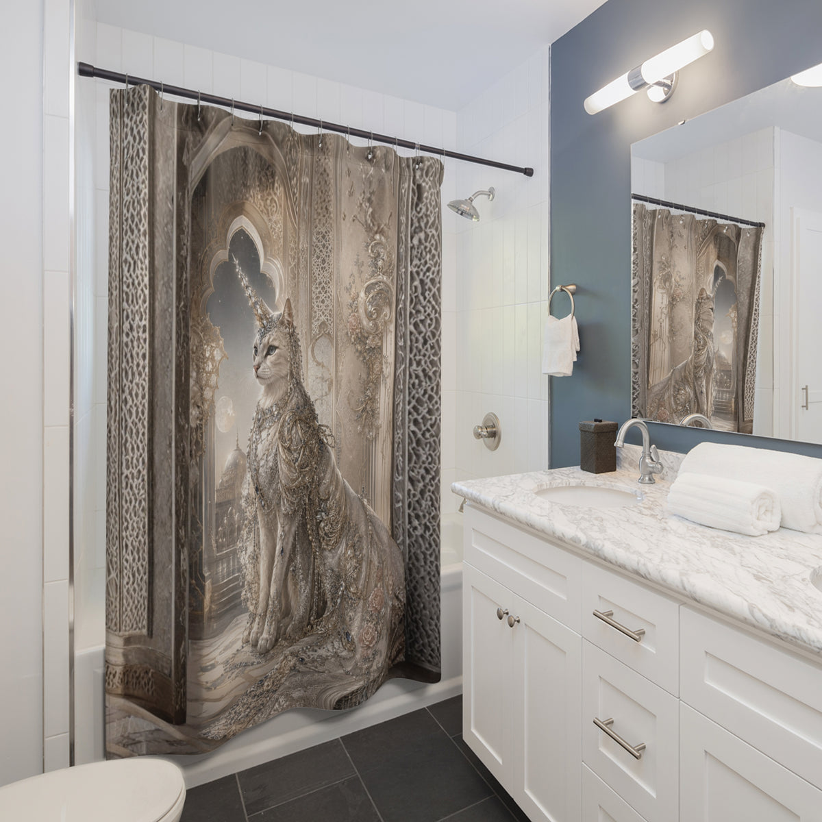 A bathroom shower curtain featuring a detailed print of an ornate cat in a luxurious robe, shown hanging in a modern white and blue bathroom.