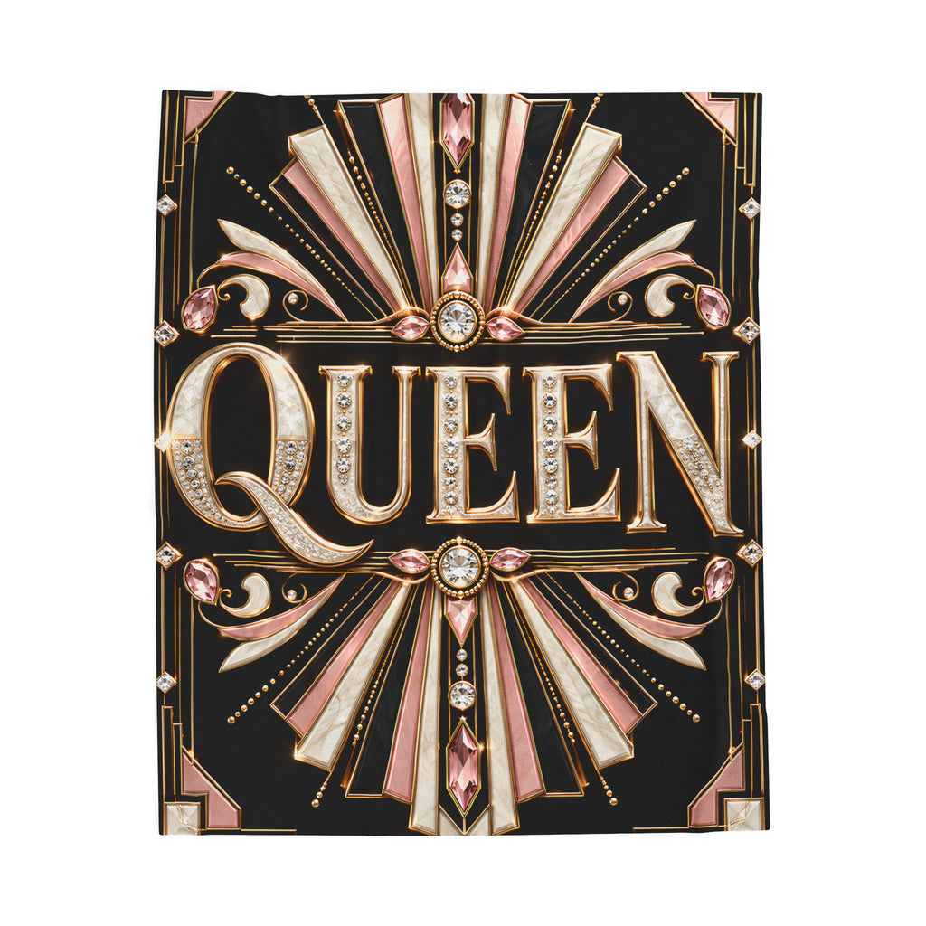 A rectangular black decorative throw featuring ornate Art Deco-style gold and blush pink geometric rays, gem motifs, and the word "QUEEN" in large gold letters with rhinestone-like detailing, shown on a plain white background.