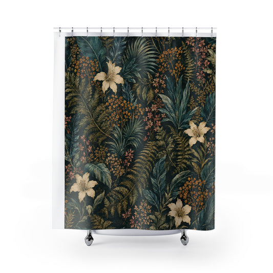 A shower curtain featuring an intricate tropical botanical pattern with dark green and teal foliage, cream-colored lilies, and small orange-brown berries on a black background. The curtain is shown hanging from silver rings on a white rod, with a white bathtub and silver feet visible underneath.