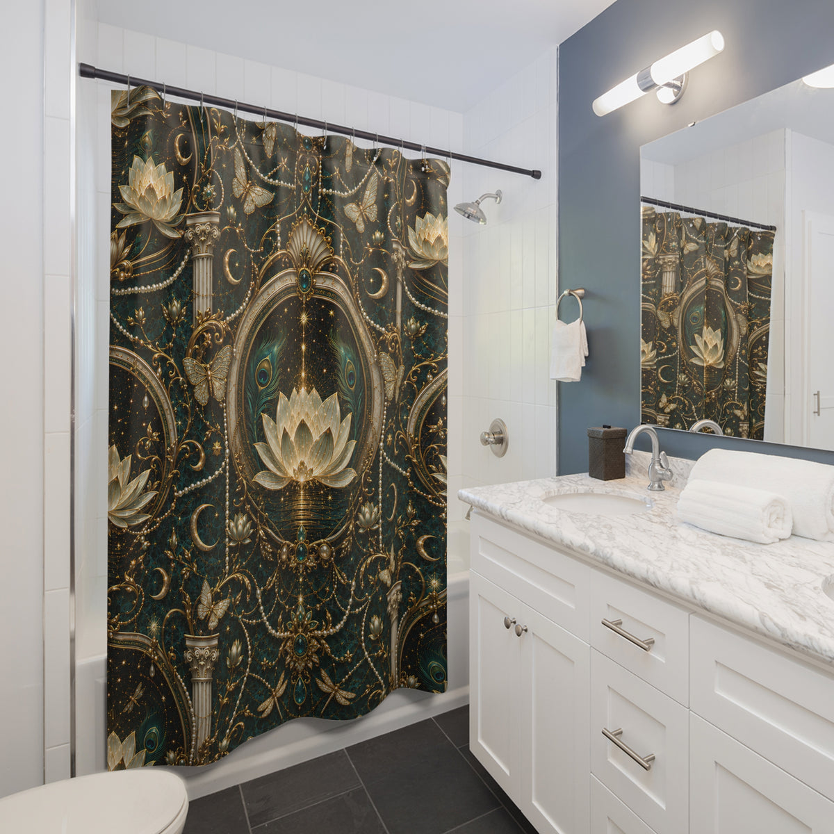 A bathroom scene showing a shower curtain with an ornate navy, silver, and white baroque-style floral pattern, installed in a modern white and blue bathroom with a marble countertop and mirror.