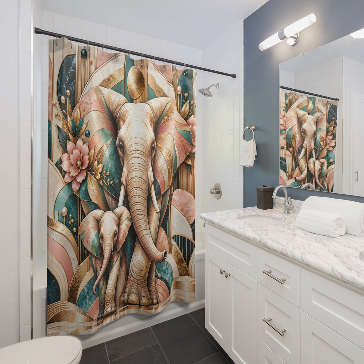 A bathroom shower curtain featuring a stylized, colorful illustration of an elephant and baby elephant with floral and geometric details, shown hanging in a modern white and gray bathroom.