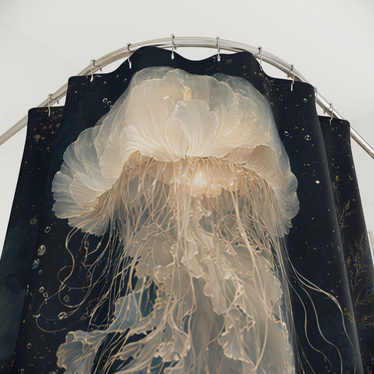 A large, realistic jellyfish sculpture or wall art hanging in front of dark navy curtains with a starry pattern, suspended from a curved metal rod against a light background.