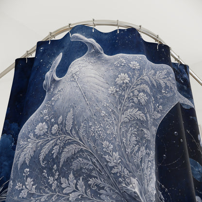 A dark blue shower curtain featuring a large white floral and leafy botanical pattern, hanging from a curved metal rod against a plain light background.
