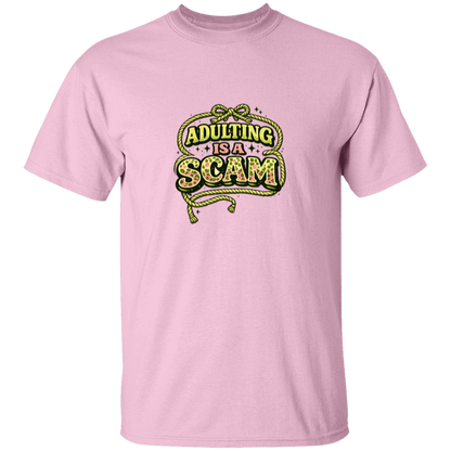 Pink t-shirt with 'Adulting is a Scam' graphic design on a white background