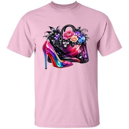 Pink t-shirt with a colorful high heel shoe and handbag graphic on a white background
